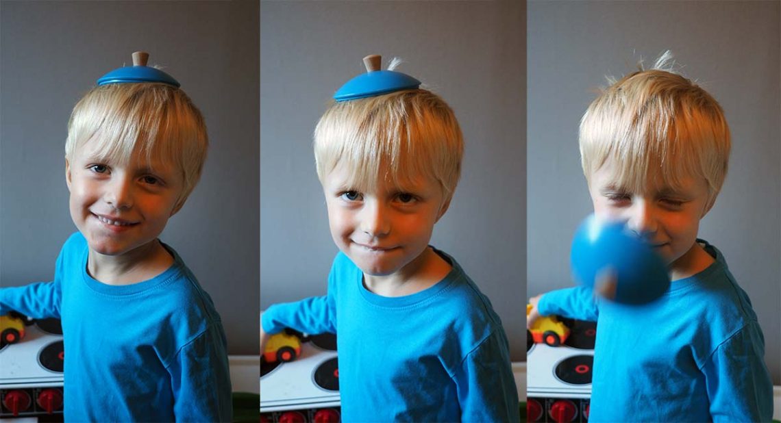 Tre bilder på Elis Wikmark, 3 år, med ett leksakskastrullock på huvudet