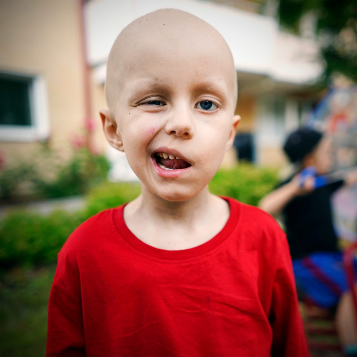 Elis, 29 juli 2018, ler sitt sneda leende